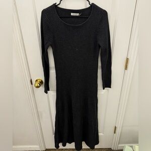 Form fitting wide neck Calvin Klein knit dress. Size L. Fits like M